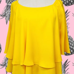 Blusa de volantes amarilla